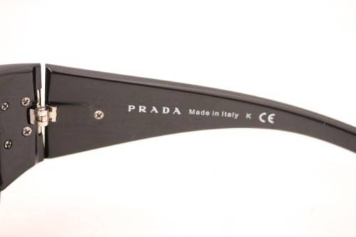 An awesome pair of black Italian made Prada (model SPR22M) ladies sunglasses w/ grey gradient lenses