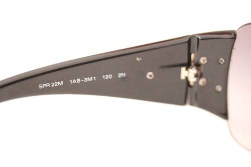 An awesome pair of black Italian made Prada (model SPR22M) ladies sunglasses w/ grey gradient lenses