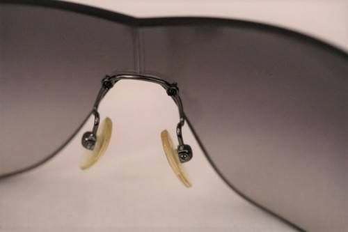 An awesome pair of black Italian made Prada (model SPR22M) ladies sunglasses w/ grey gradient lenses