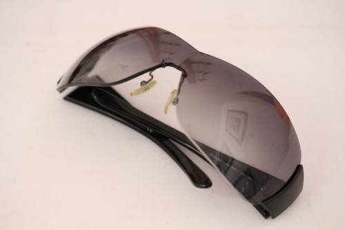 An awesome pair of black Italian made Prada (model SPR22M) ladies sunglasses w/ grey gradient lenses