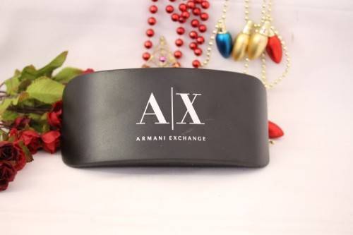 A stunning pair of black Armani Exchange (model AX2007) unisex sunglasses in its original case