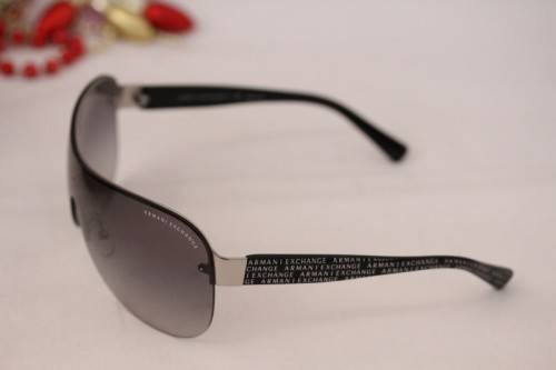 A stunning pair of black Armani Exchange (model AX2007) unisex sunglasses in its original case
