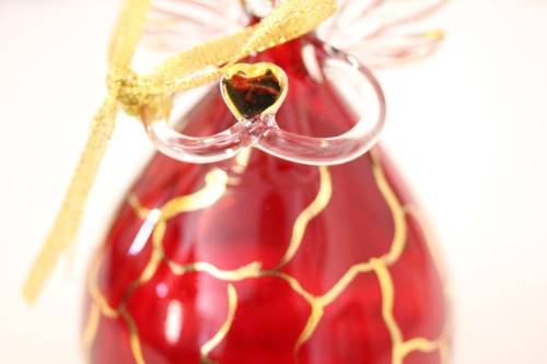 **RS17** A made hand-blown Italian red-glass angel finished with gold detailing by Flamigni