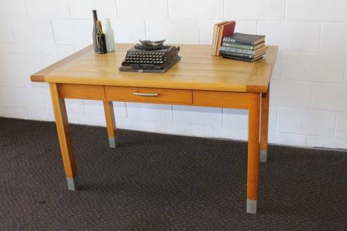 A magnificent "Marks and Spencer" modern Oak desk with metal feet caps and an uncomplicated design!!