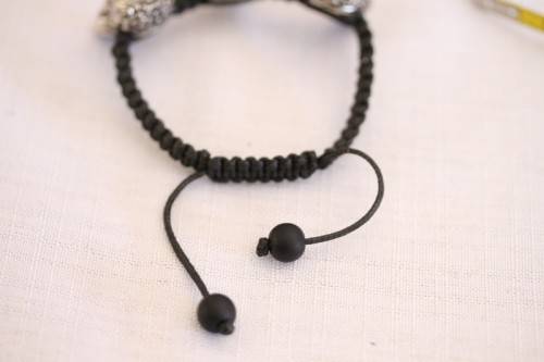 **RS17** An awesome & unusual skull necklace w/ black stones & diamante & a "skull" bracelet