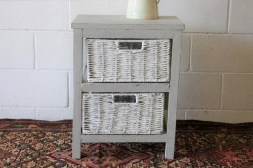 An awesome grey wooden 2-drawer pedestal with white wicker drawers - great in the bathroom