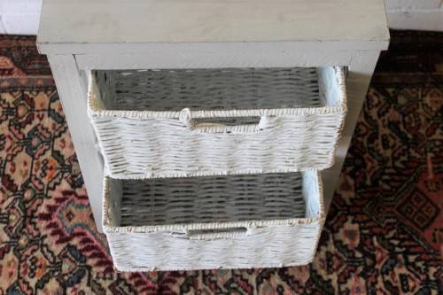 An awesome grey wooden 2-drawer pedestal with white wicker drawers - great in the bathroom