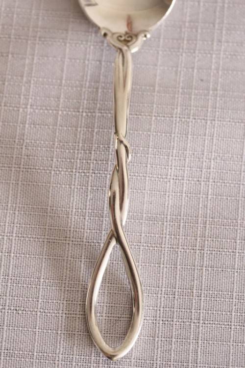 A beautiful antique sterling silver Art Nouveau (c1895 to 1910) USA made fruit spoon & fork set