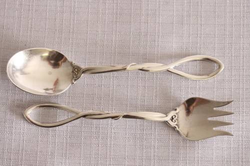 A beautiful antique sterling silver Art Nouveau (c1895 to 1910) USA made fruit spoon & fork set