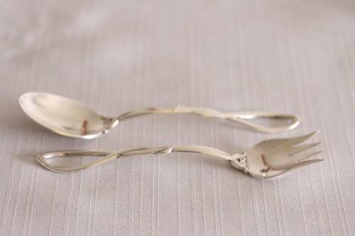 A beautiful antique sterling silver Art Nouveau (c1895 to 1910) USA made fruit spoon & fork set