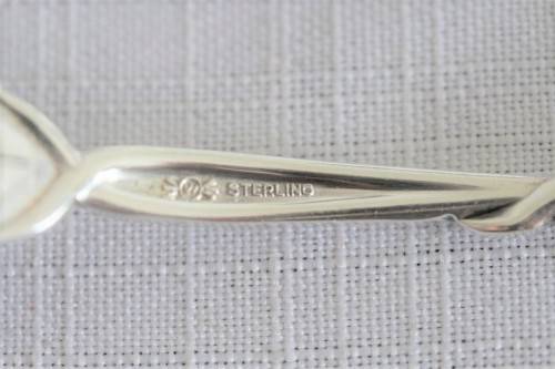 A beautiful antique sterling silver Art Nouveau (c1895 to 1910) USA made fruit spoon & fork set
