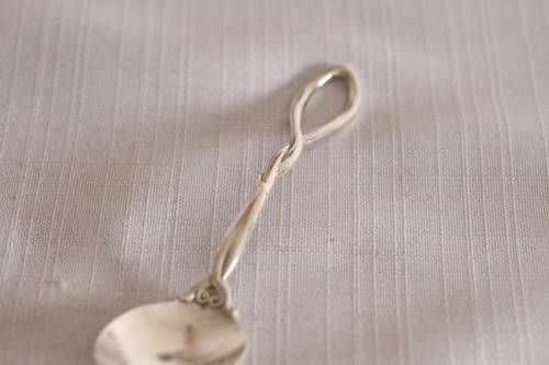 A beautiful antique sterling silver Art Nouveau (c1895 to 1910) USA made fruit spoon & fork set