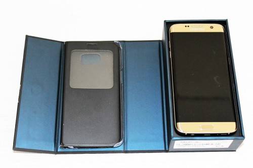 **RS17** Samsung Galaxy S7 Edge w/ cover in the original box w/ charger - great working condition!!