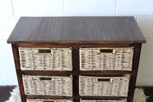 An awesome dark wooden 6-drawer cabinet with wicker drawers - great in the bathroom or bedroom!