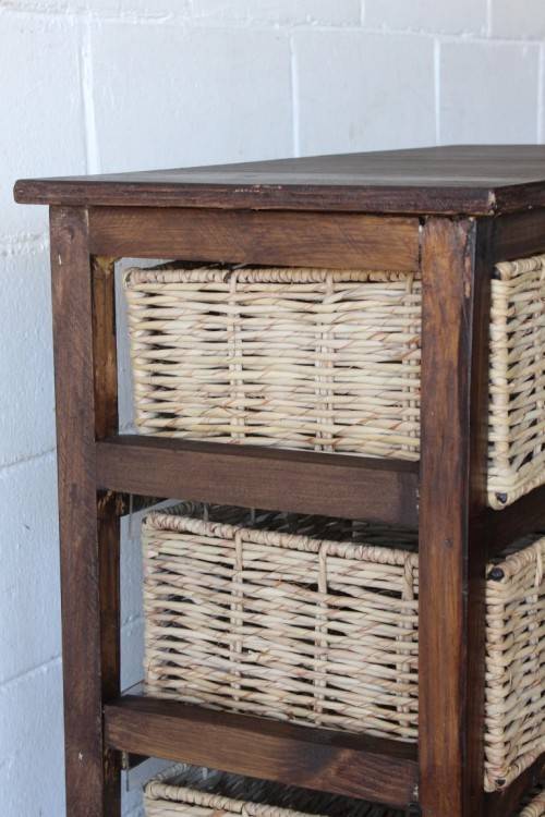 An awesome dark wooden 6-drawer cabinet with wicker drawers - great in the bathroom or bedroom!