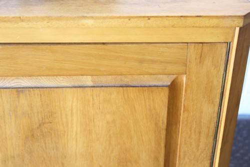 A lovely Oak single-door corner cabinet with shelves on the inside. Perfect for smaller spaces!!