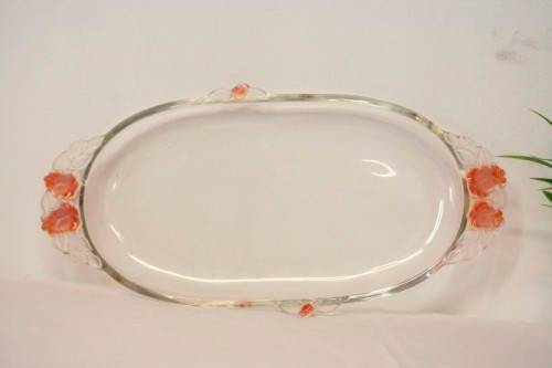 A stunning decorative oval shaped glass serving platter in excellent condition.