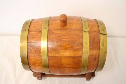 A fabulous small vintage solid Oak wine barrel with its original brass hoops, tap and stand!