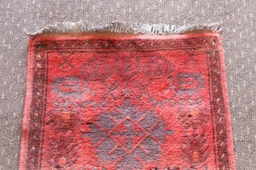 A stunning vintage traditional burgundy Afghan Persian carpet in good condition