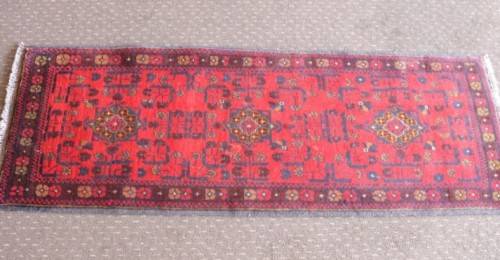 An incredible and beautifully made (154cm x 54cm) Pakistani Bokhara carpet in beautiful condition