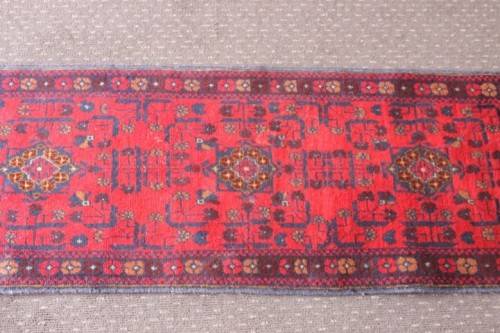An incredible and beautifully made (154cm x 54cm) Pakistani Bokhara carpet in beautiful condition