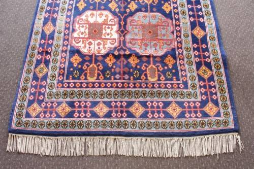 A beautiful and very well made colourful Russian Derbent carpet in light & dark blue, reds and rust