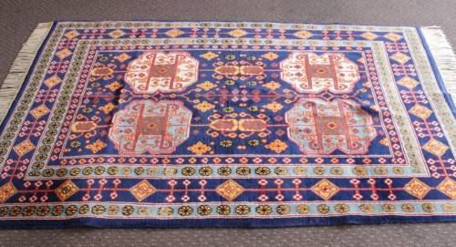 A beautiful and very well made colourful Russian Derbent carpet in light & dark blue, reds and rust