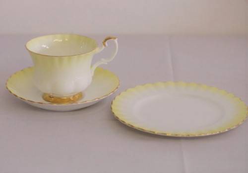A gorgeous vintage Royal Albert porcelain trio in the beautiful "Rainbow Yellow" pattern