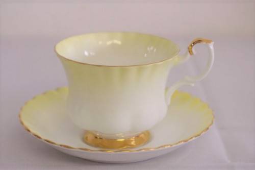 A gorgeous vintage Royal Albert porcelain trio in the beautiful "Rainbow Yellow" pattern