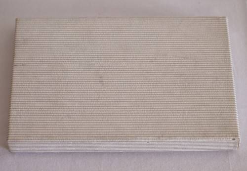 **RS17** A boxed set of Royal Dutch Silverworks "Elwezetta Line" chrome plated spoons & tea strainer
