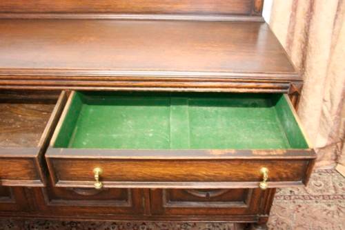 An exquisite vintage Oak side server cabinet with brass handles & loads of drawer & cupboard space
