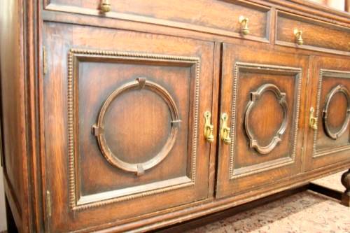 An exquisite vintage Oak side server cabinet with brass handles & loads of drawer & cupboard space