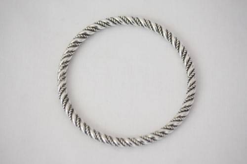 An incredible and beautifully made pure silver (999) ladies twirled bracelet in awesome condition