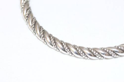An incredible and beautifully made pure silver (999) ladies twirled bracelet in awesome condition