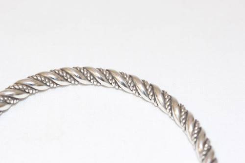An incredible and beautifully made pure silver (999) ladies twirled bracelet in awesome condition