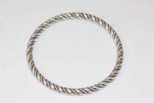 An incredible and beautifully made pure silver (999) ladies twirled bracelet in awesome condition