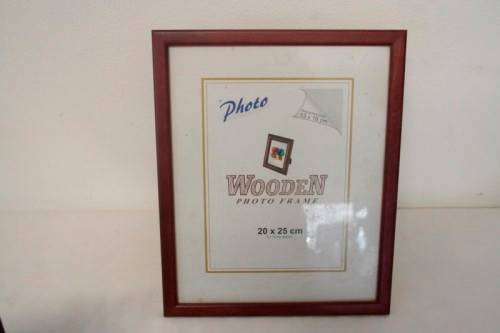 **RS17** Four lovely medium sized assorted free standing photo frames with glass.