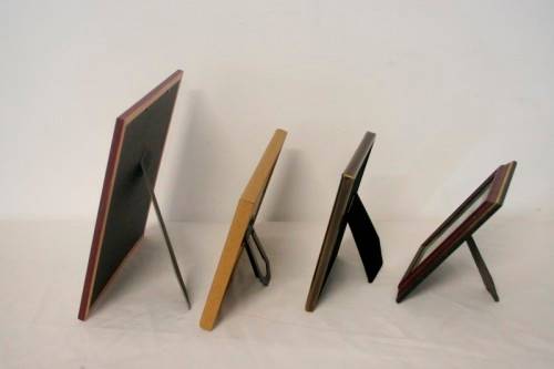 **RS17** Four lovely medium sized assorted free standing photo frames with glass.