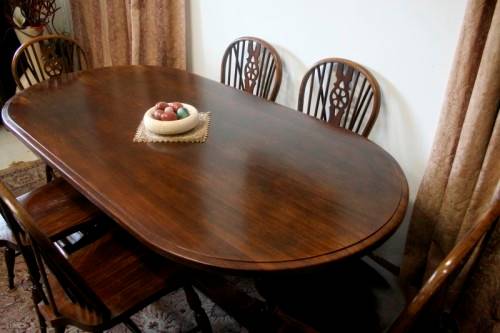 **RS17** A vintage solid Oak 6-seater dining room table with six Brace-back Windsor chairs