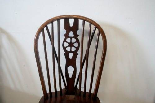 **RS17** A vintage solid Oak 6-seater dining room table with six Brace-back Windsor chairs
