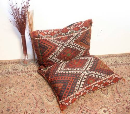 A stunning top-quality colourful hand made Persian camel saddle back double cushion.
