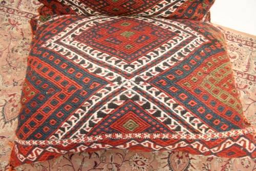 A stunning top-quality colourful hand made Persian camel saddle back double cushion.