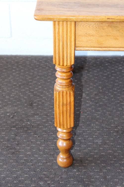 A lovely solid Oak center coffee table with turned legs and uncomplicated design - stunning!!
