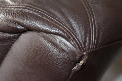 A stunning & very comfortable top-quality full-grain brown leather recliner chair in great condition