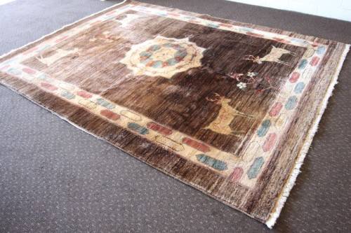 **RS17** A stylish & unusual brown Iranian Meshkin Persian Carpet w/ deer motifs & centre medallion