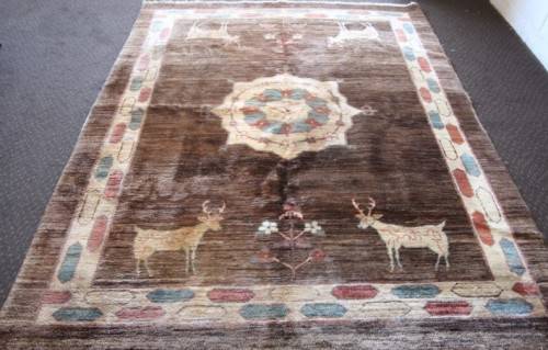 **RS17** A stylish & unusual brown Iranian Meshkin Persian Carpet w/ deer motifs & centre medallion