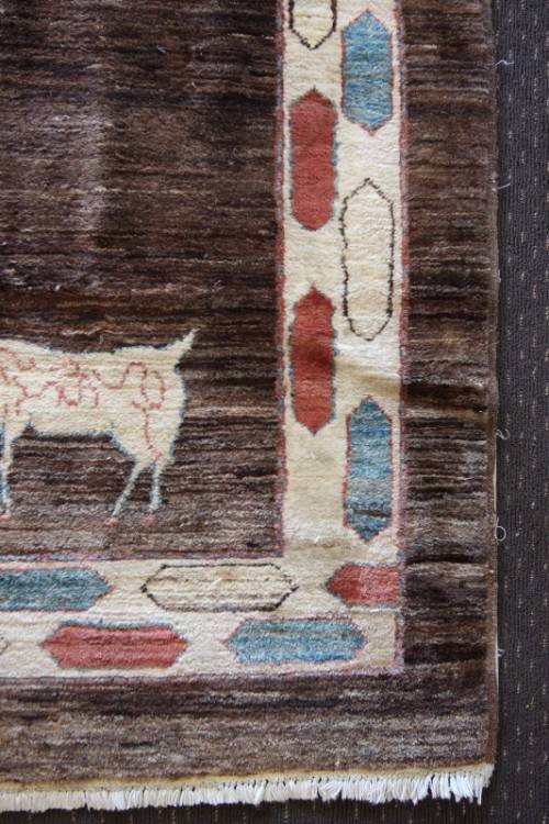 **RS17** A stylish & unusual brown Iranian Meshkin Persian Carpet w/ deer motifs & centre medallion