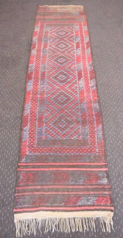 A stunning vintage Persian runner carpet (245cm long) in reds and grey in good condition