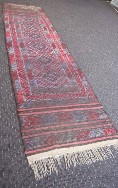 A stunning vintage Persian runner carpet (245cm long) in reds and grey in good condition