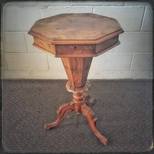 **RS17** An antique (c1890's) Victorian walnut octagonal sewing table w/ an array of compartments